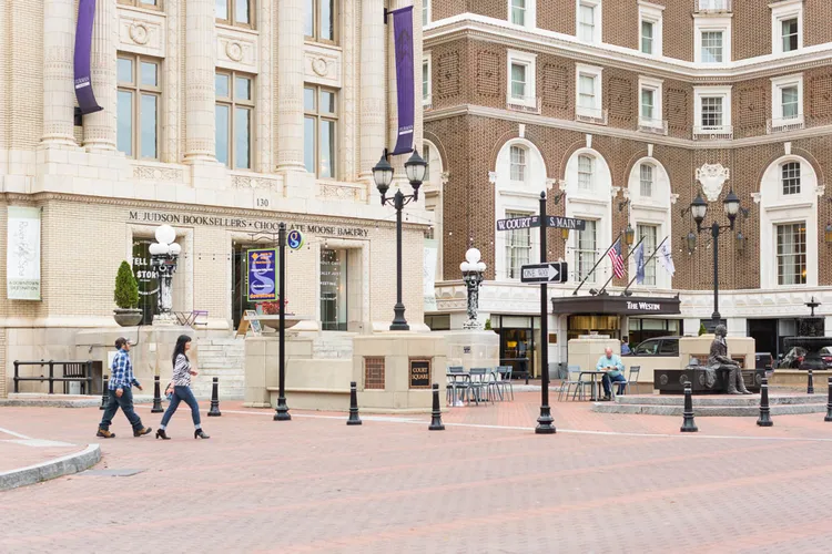Visitors walk down Main St. in Greenville, South Carolina.