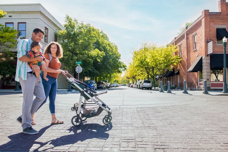 A young family walks in downtown Boise, Idaho.